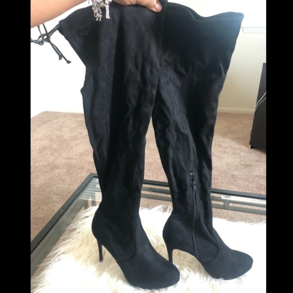 Thigh high stiletto boots